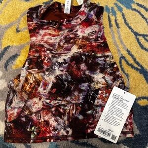 NWT Lululemon Everlux & Mesh Cropped Tank
Size 6
Urbantricity Multi/Terracotta